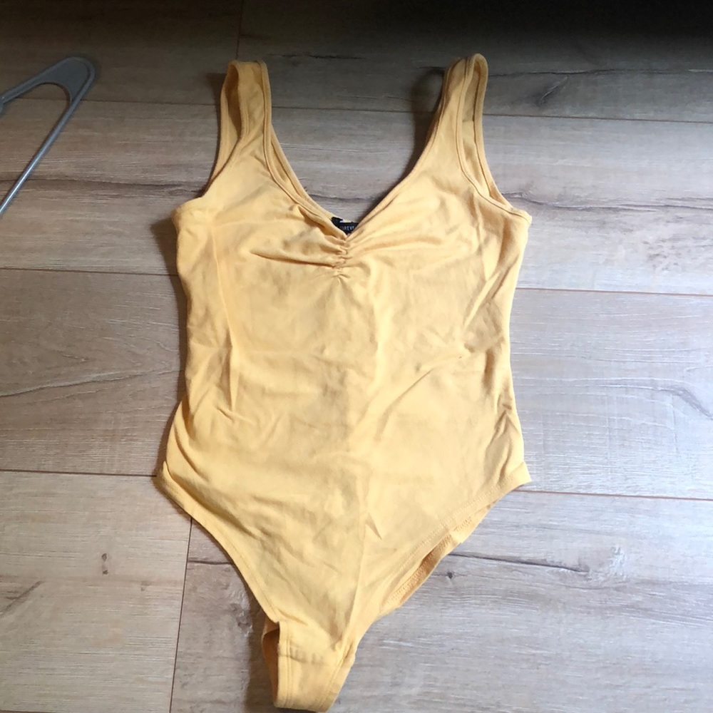 Yellow body suit
